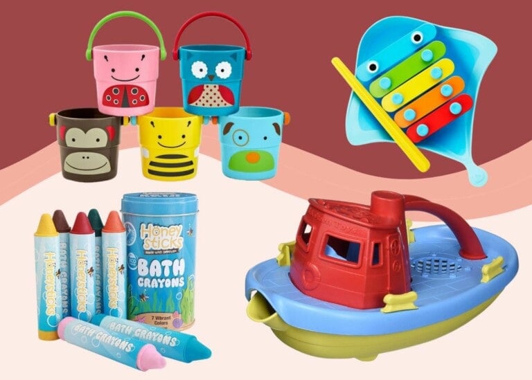 This image showcases an array of bath toys, featuring colorful buckets with various animal designs, a fish-shaped xylophone, a pack of Honey Sticks bath crayons, and a red and blue toy boat. The background is adorned with soft shades of pink.