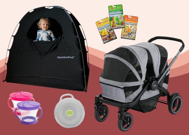 A collection of baby travel essentials for traveling with toddlers, including a black SlumberPod with a baby inside, a gray stroller, a set of two pink and purple snack containers, a white sound machine, and three packs of Water Wow travel coloring books.