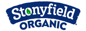 The image shows the Stonyfield Organic logo, featuring the brand name in white with a green leaf inside the letter "O" in "Stonyfield." The text is set in a blue arch for "Stonyfield" and straight for "ORGANIC.